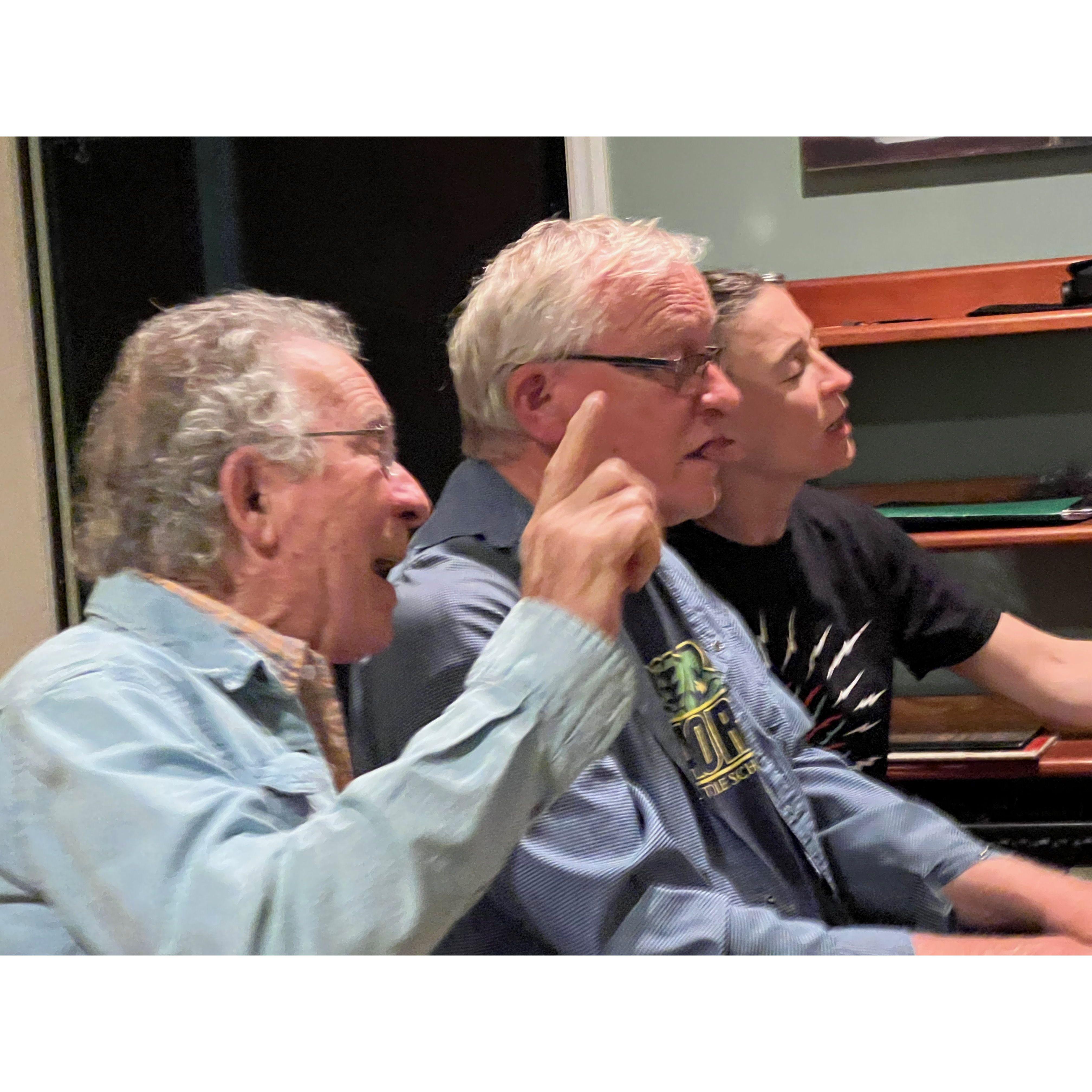 Manda's Uncle Fred on the piano, Manda and Wes singing along, loudly