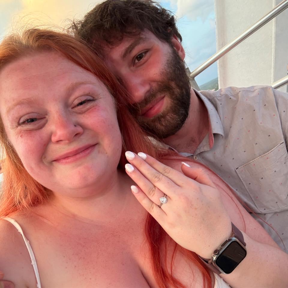 You can guess what just happened! A sunset ride on the Ferris Wheel in Branson was the perfect setting for our engagement!