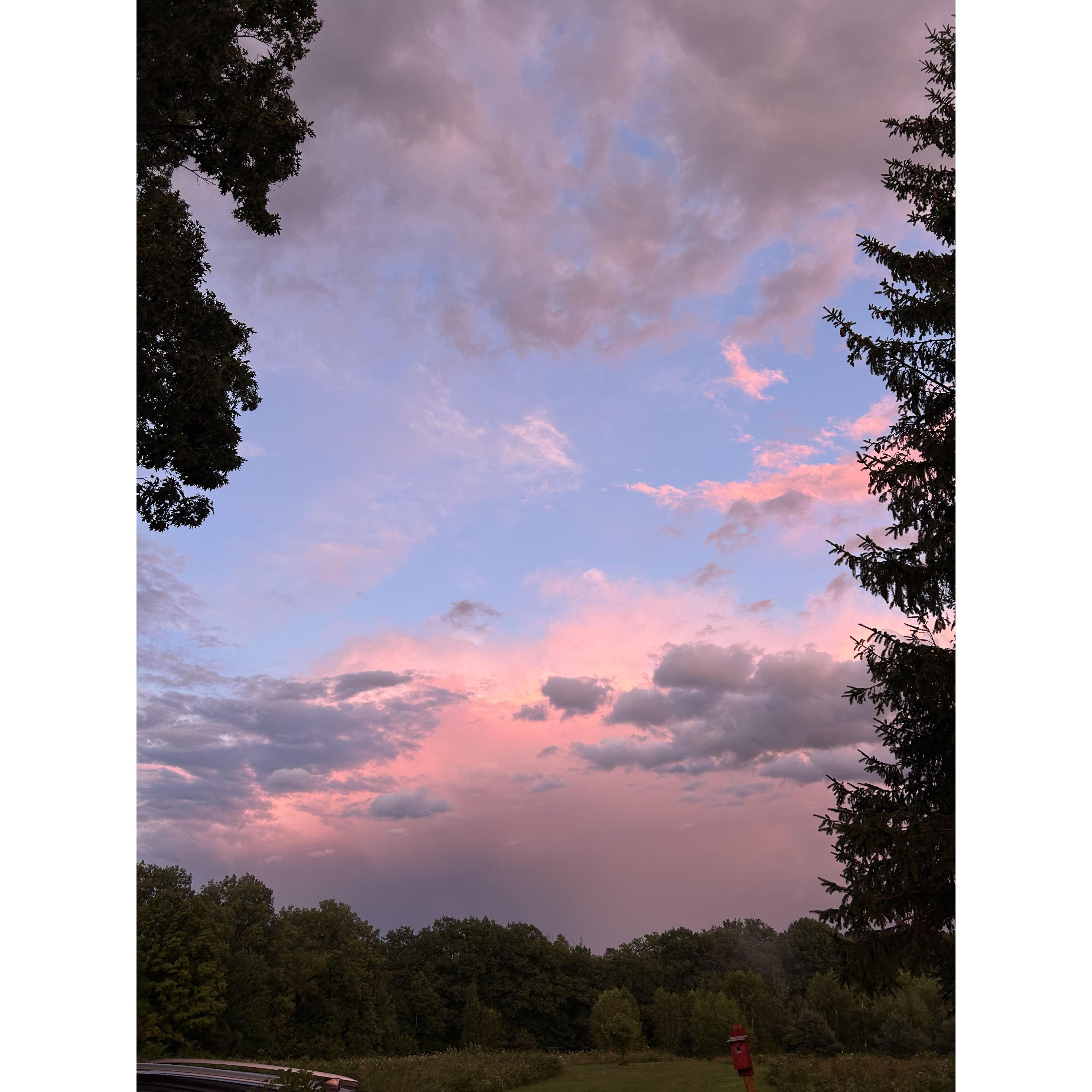 An example of a gorgeous sunset sky over the back field behind The Overlook, the location of our reception.