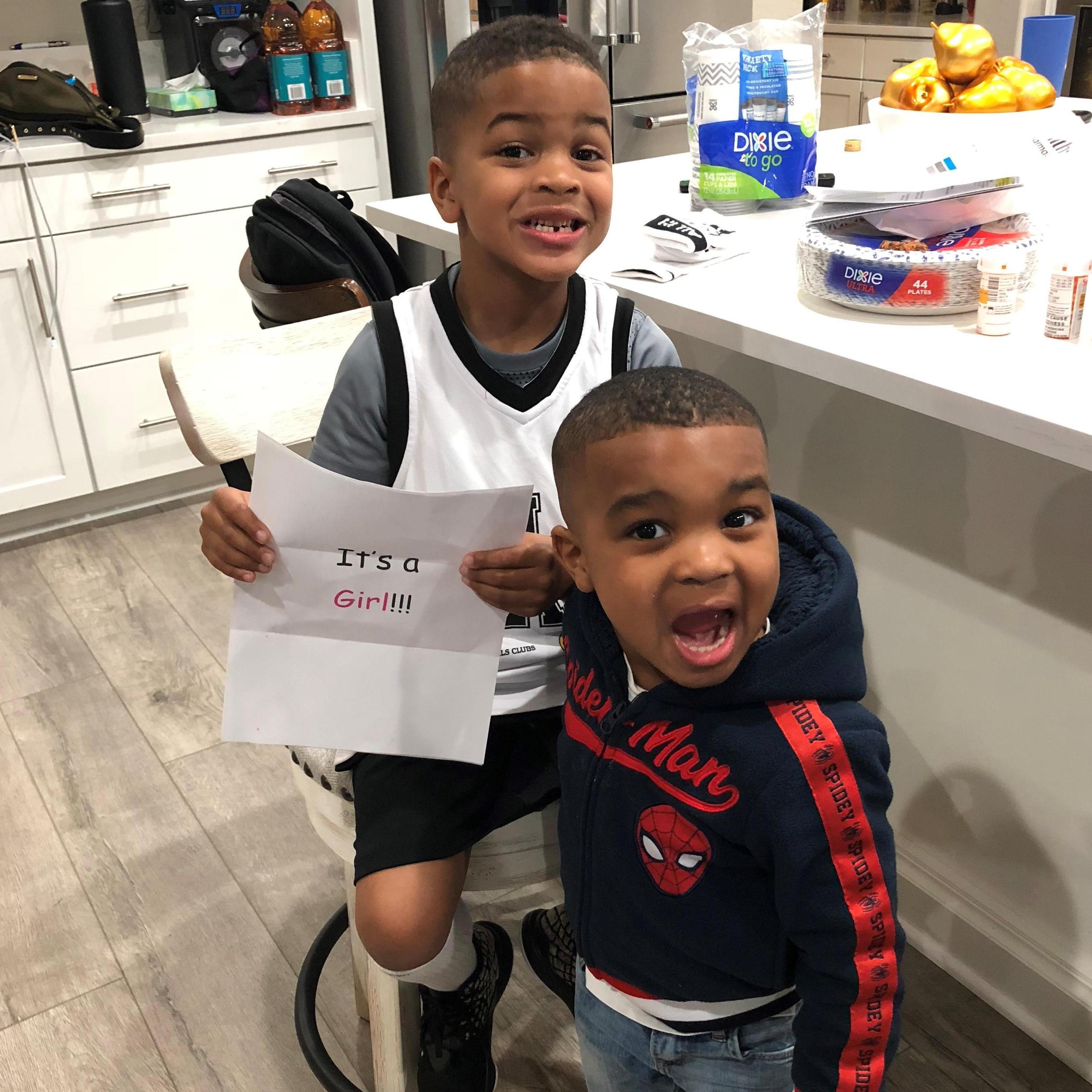 The look on the boys face when we all found out we were having a little GIRL! LOL