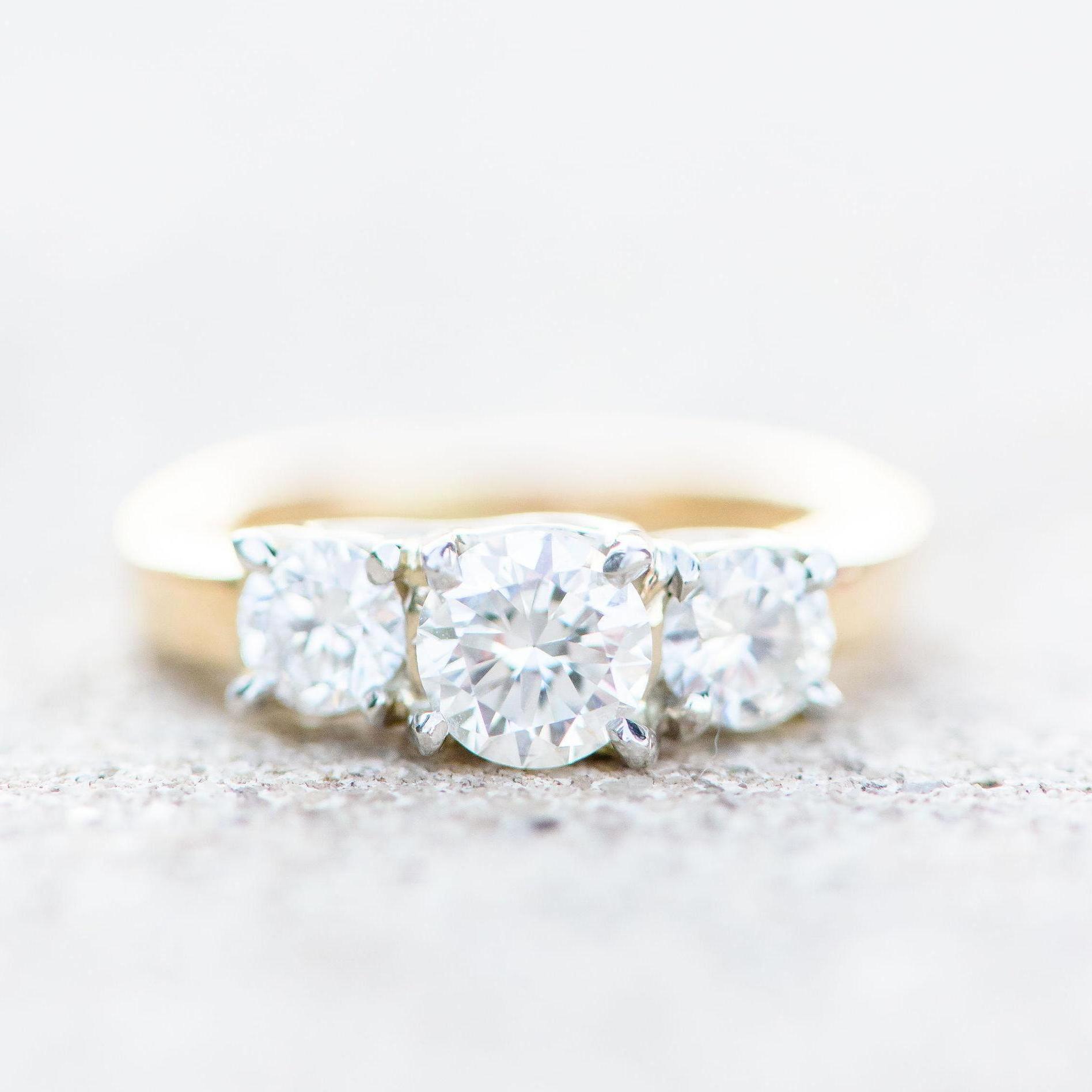 My grandma gave us her ring, which also holds a diamond from Big Emmye's original engagement ring <3