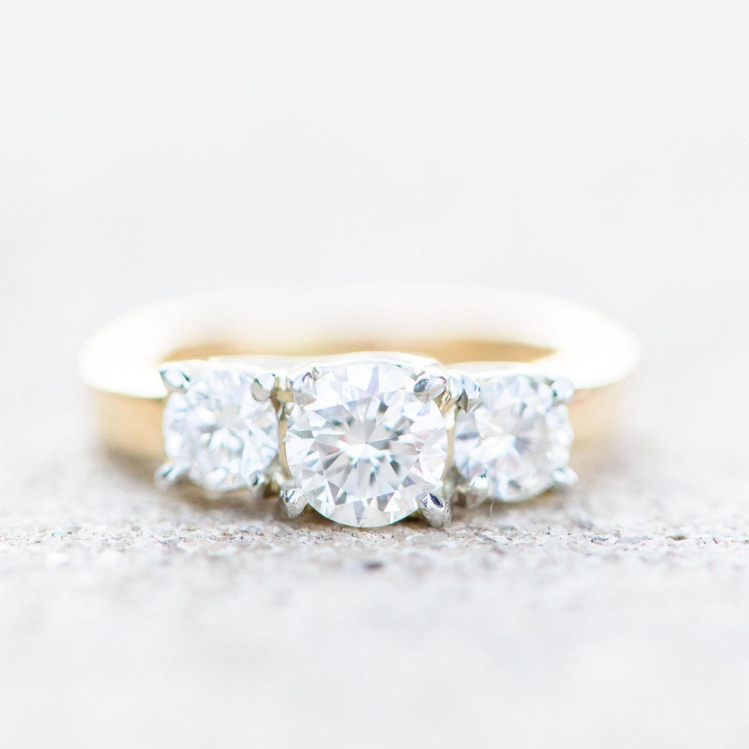 My grandma gave us her ring, which also holds a diamond from Big Emmye's original engagement ring <3