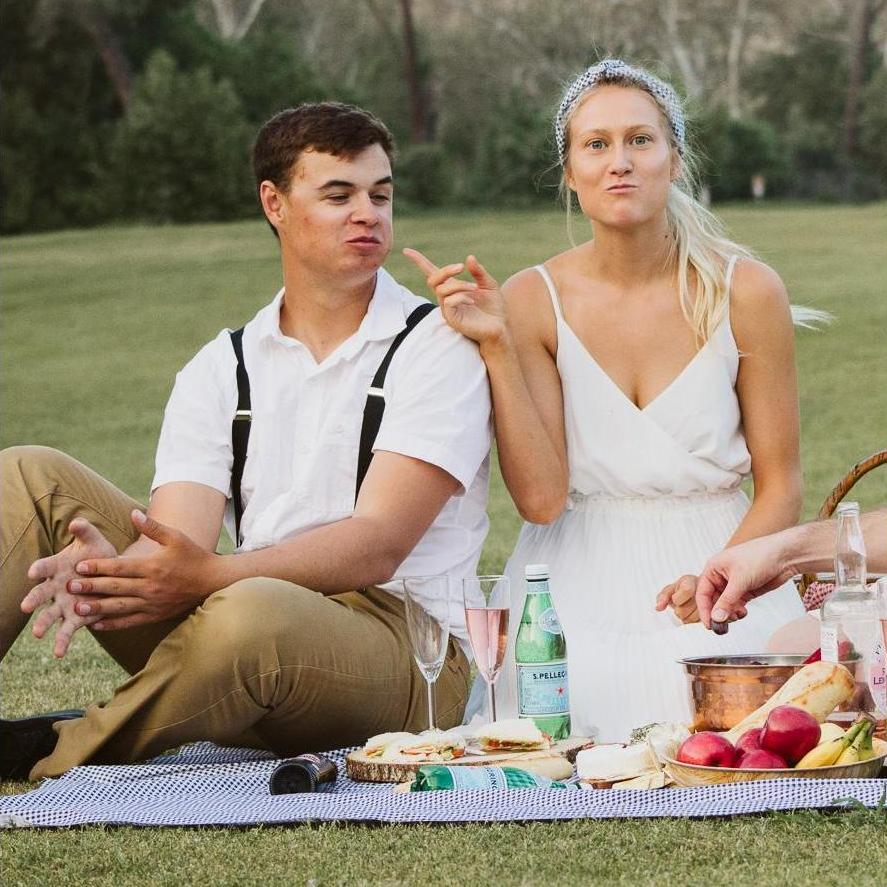 Chad gave me a break from college studying and snuck me to a romantic picnic on a golf course after hours so we had all the scenery to ourselves!