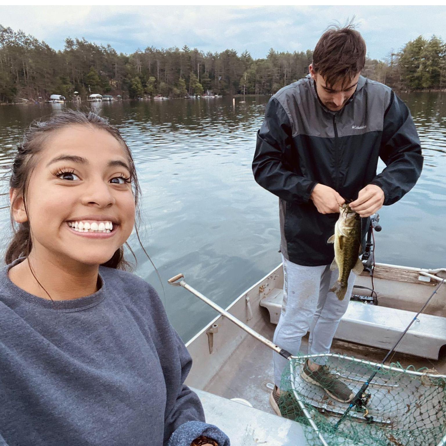 Ale's first catch at the infamous Cottage (Ale couldn't touch it, so Sam had to help)