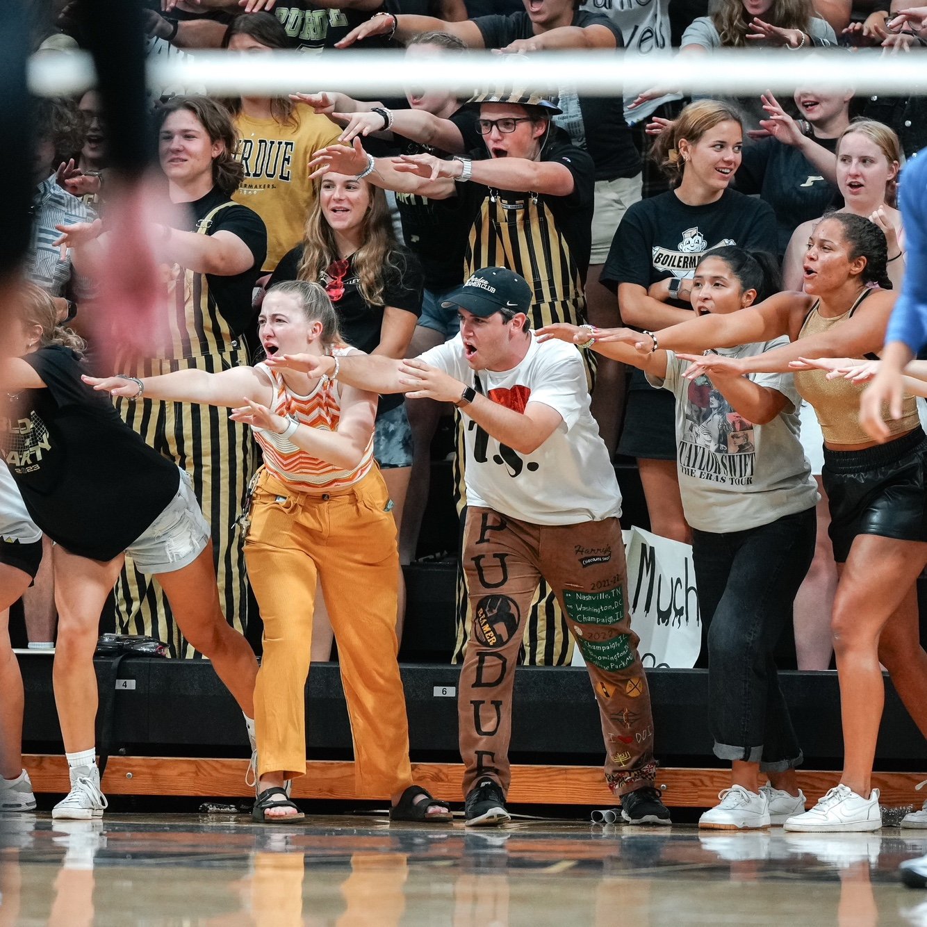 Front and center trying to distract the Creighton server. It was Taylor Swift Night, hence the outfits - Alex is wearing his Senior Cords, a 120-year old Purdue tradition kept alive by Reamers.