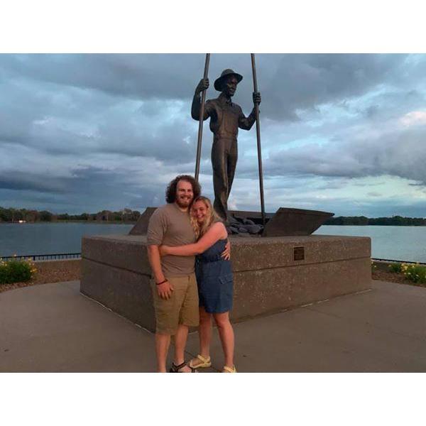A kind stranger took this picture right after Carter proposed by the Muscatine riverfront.