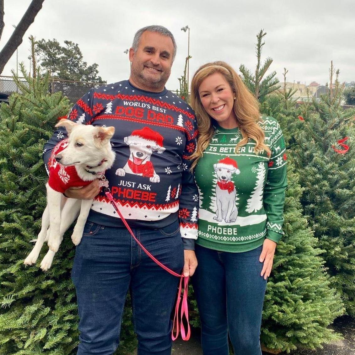 Christmas tree lot with Phoebe (who is too embarrassed of her parents' sweaters to even look at the camera)