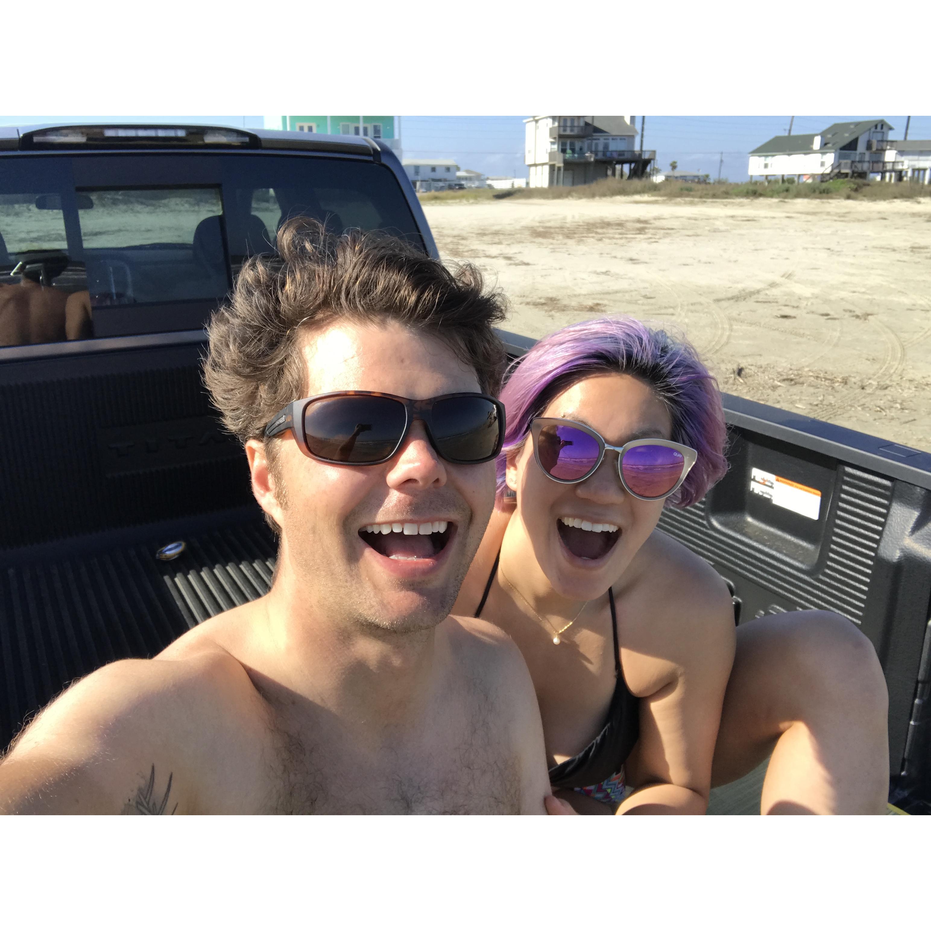 We're on a pickup truck on a beach! Janet's first love of Texas.