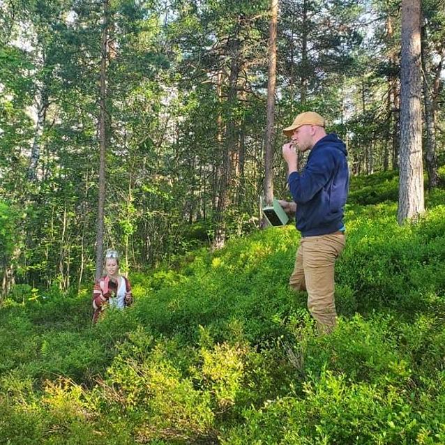 Eating wild blueberries in Norway behind Robert's family home, Summer 2019.