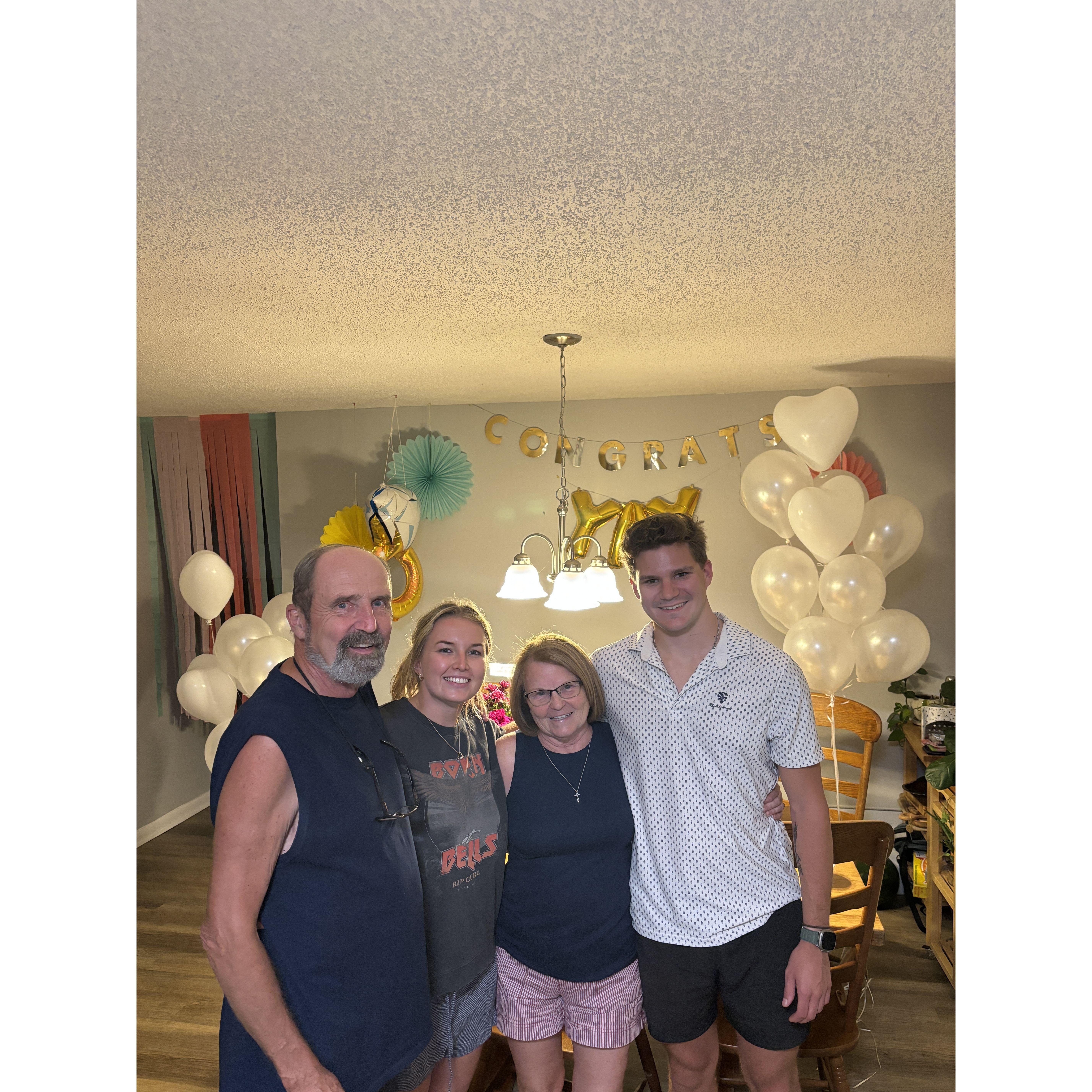 A surprise engagement party. Pictured with adopted grandparents John and Ruby.