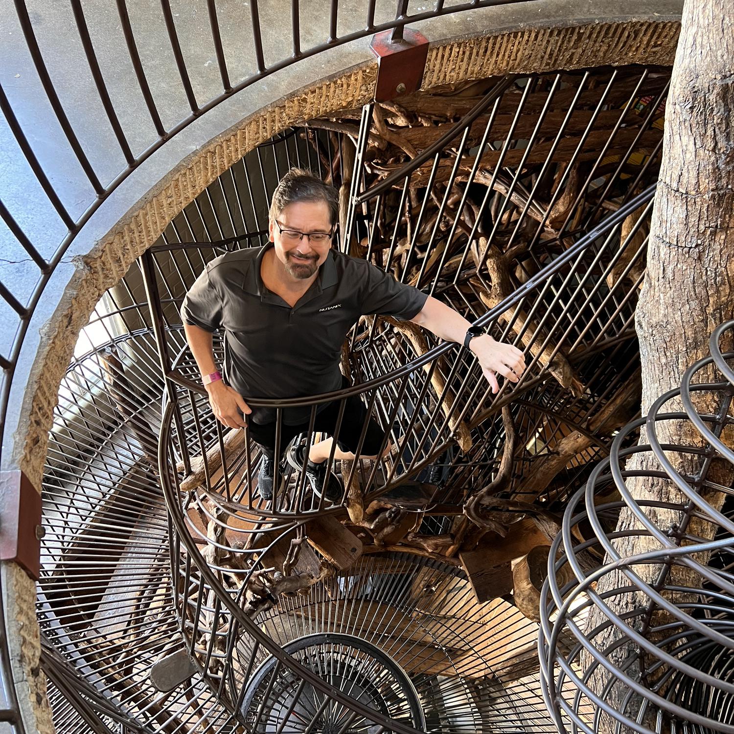 Jon heading down a spiral staircase at the City Museum in Missouri