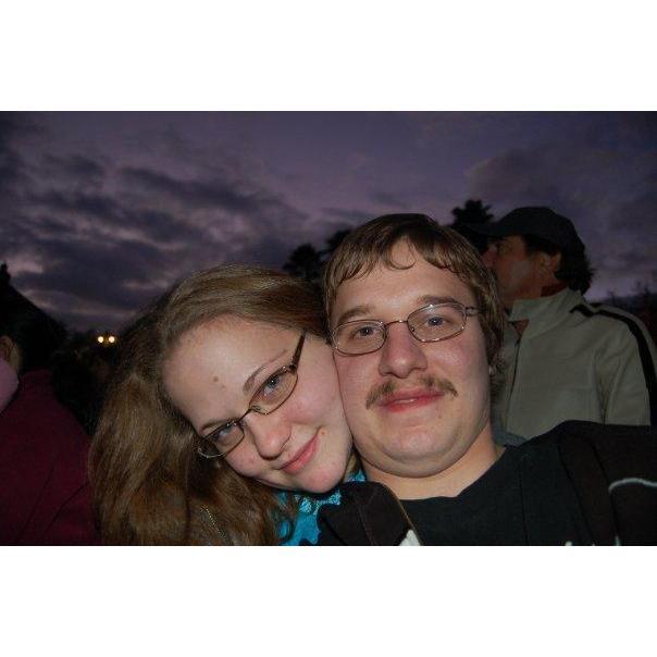 Waiting for Fantasmic (their favorite show) on the first Disney trip they took together.