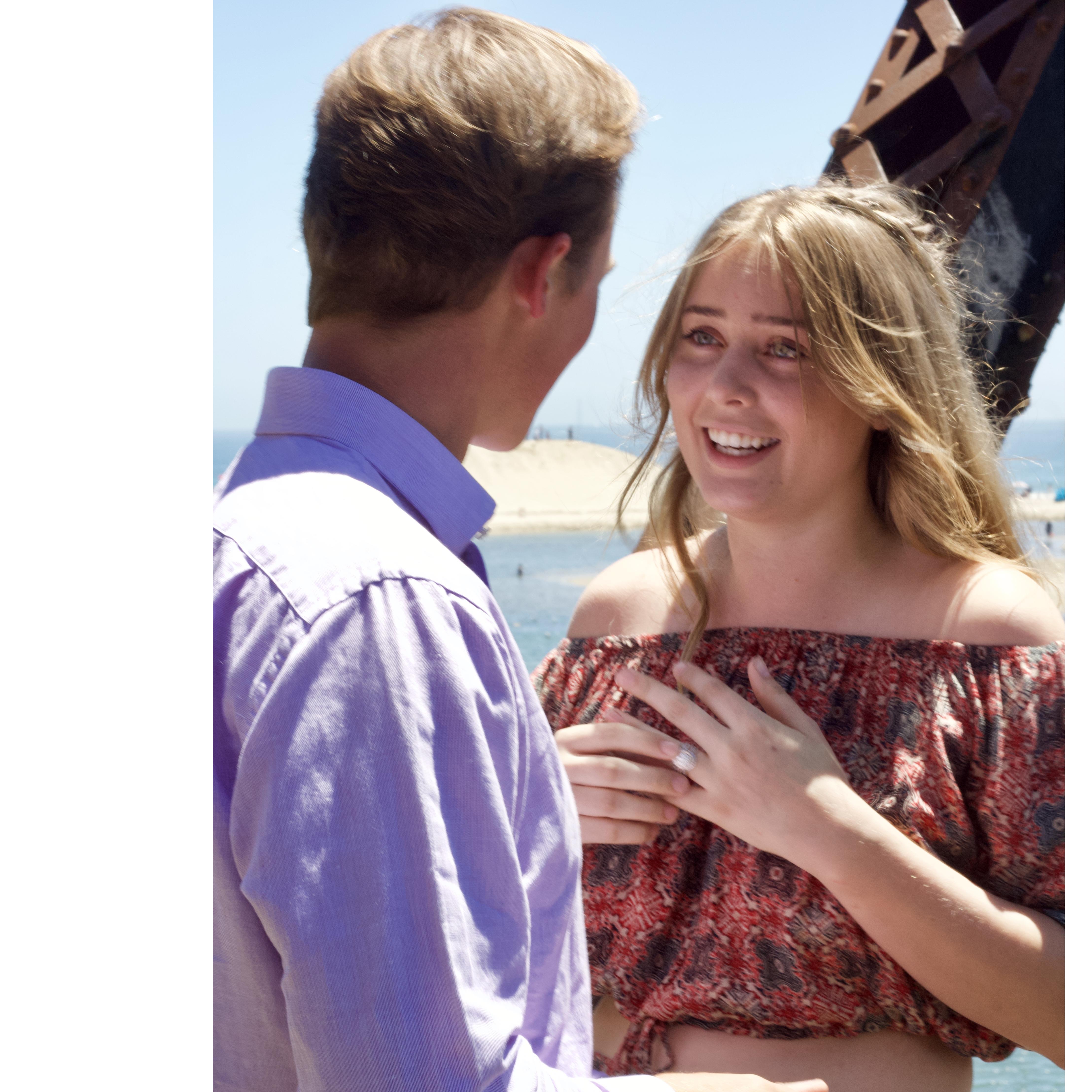 Surprise engagement at the Santa Cruz Boardwalk.
