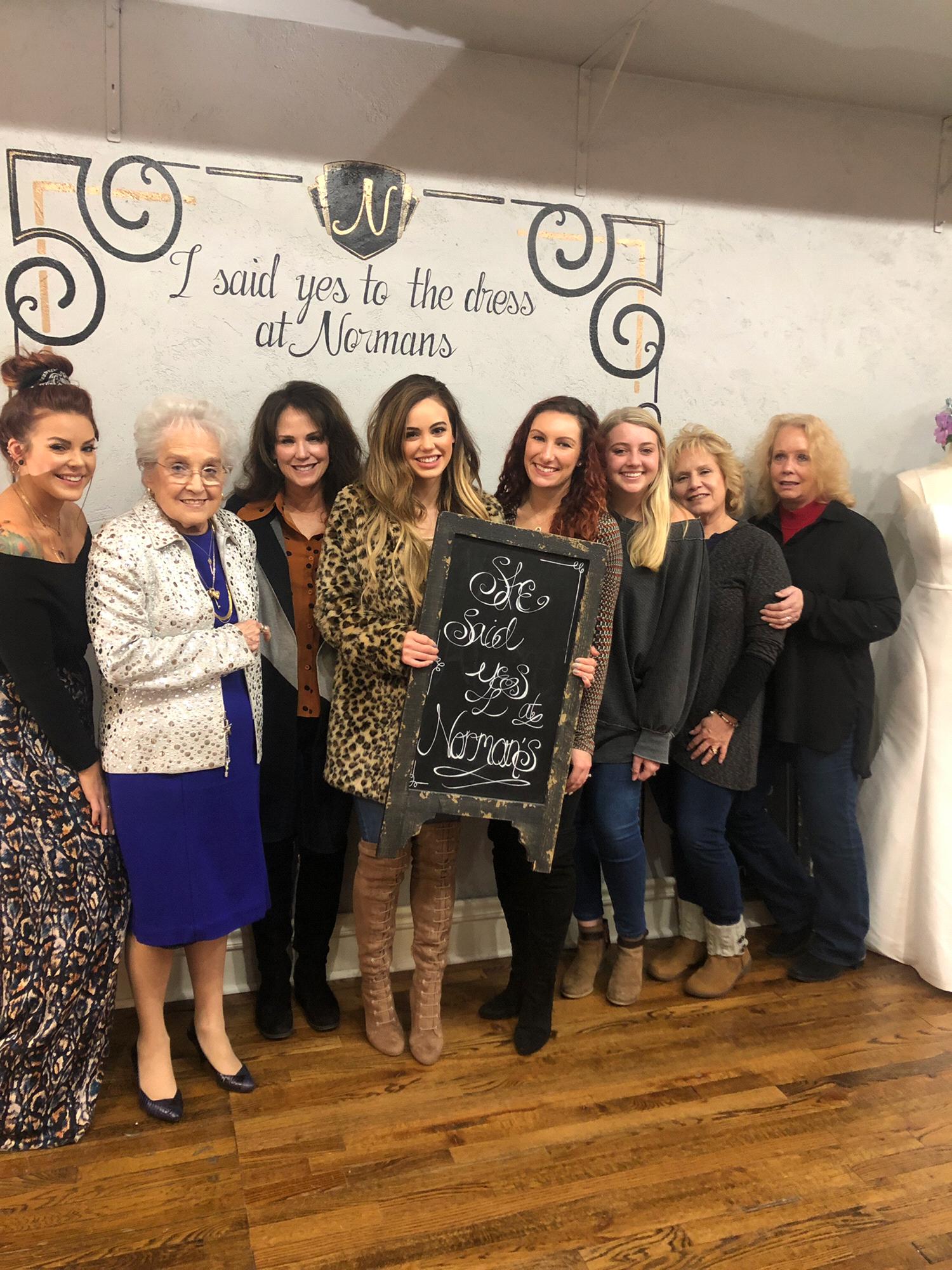 Kalynn's friends and family helping her pick the dress of her dreams!