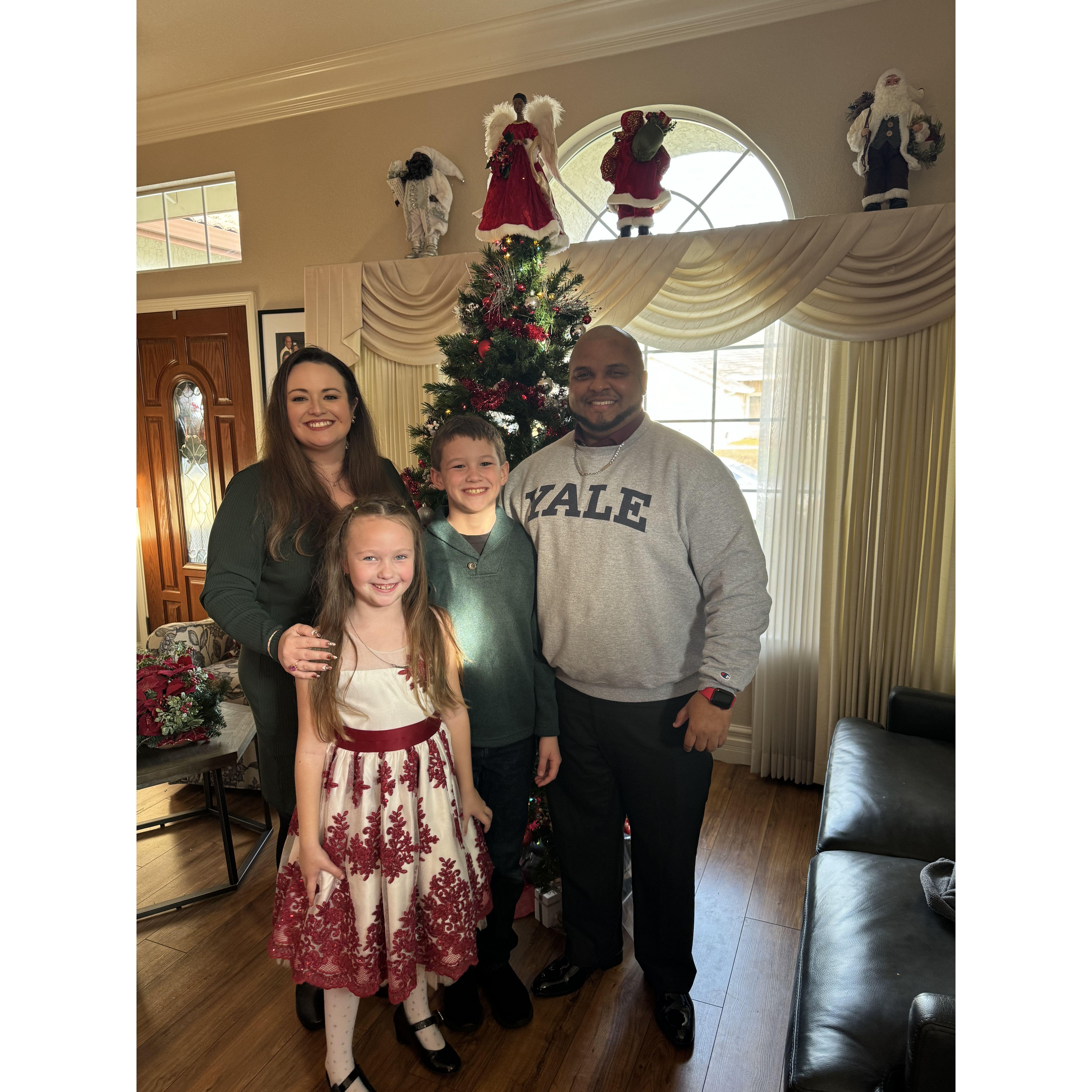 Christmas Eve 2023 with our beautiful children- Christopher and Marianna.