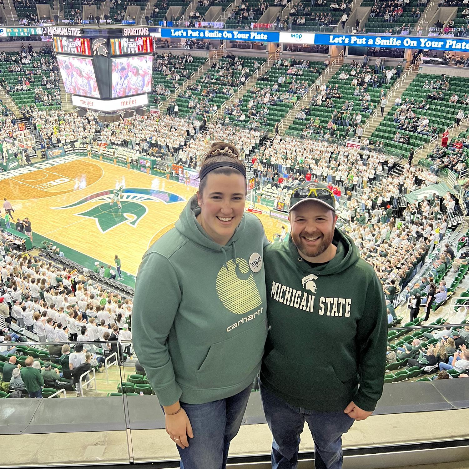 MSU B-ball, somehow Emily was convinced to wear Green