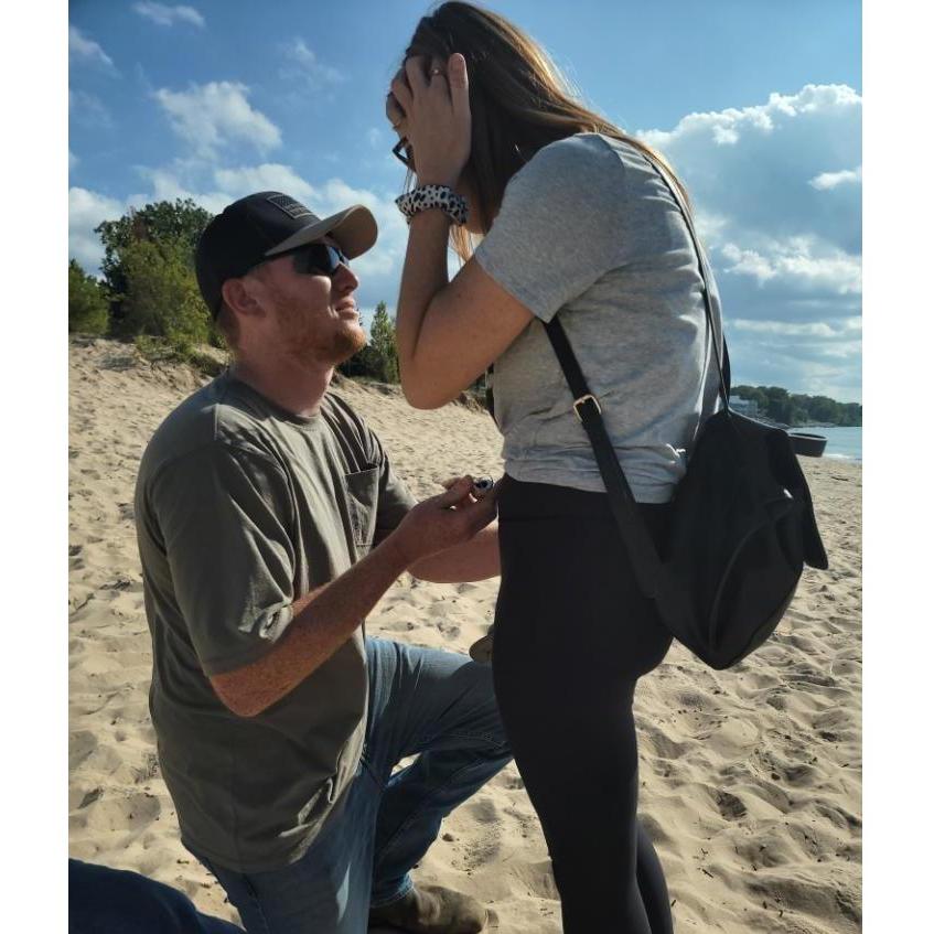 Kennedy snapped this picture of Zach proposing. <3