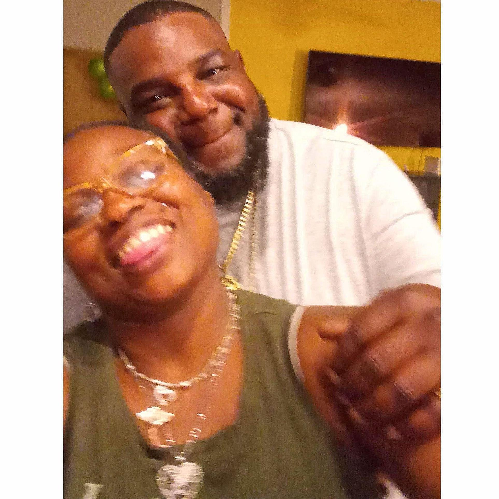 Clowning around being our silly selves. Love is laughter.