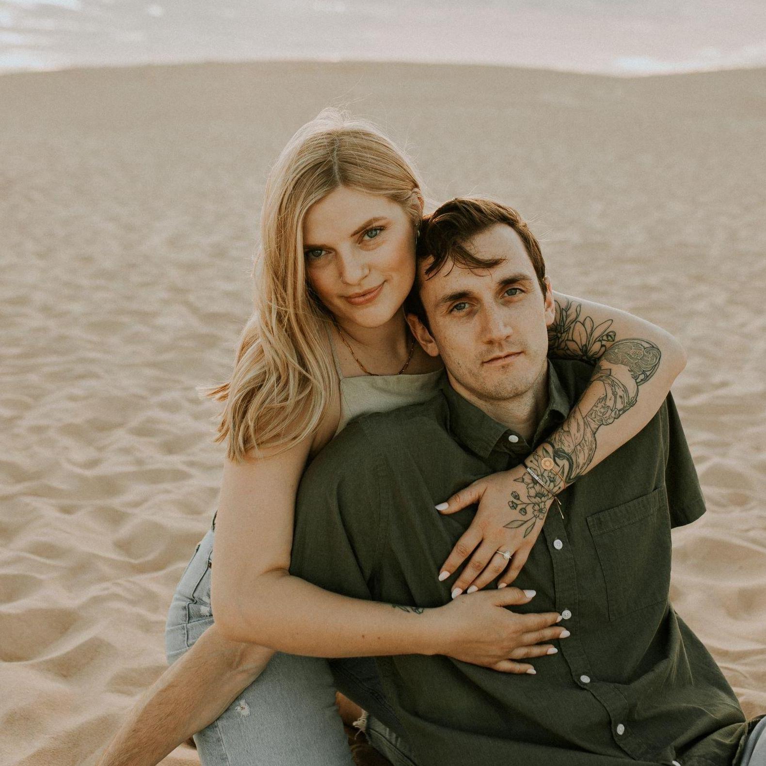Our first nice looking photo together - our engagement photos at Silver Lake Sand Dunes.