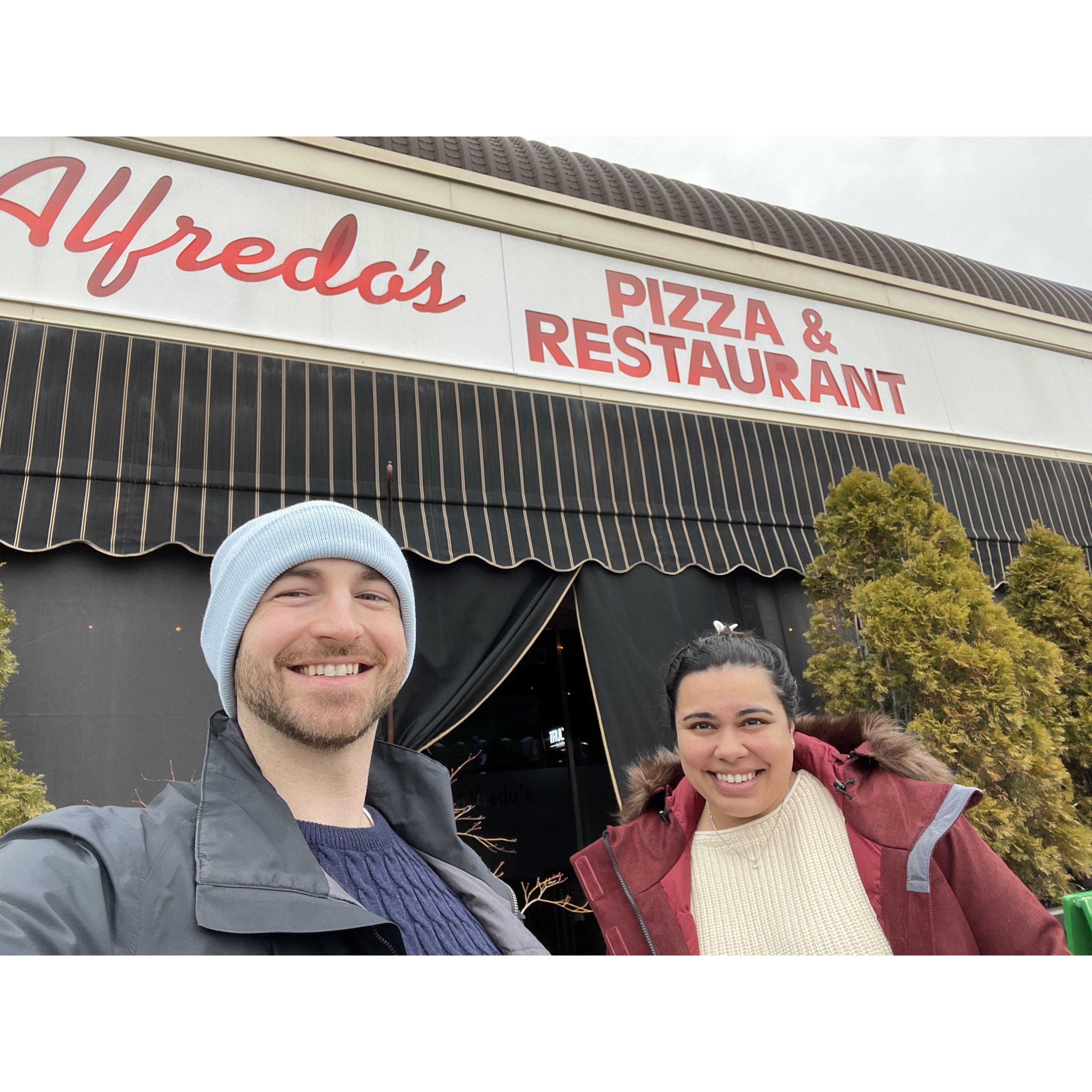Tasting the "right Alfredos" pizza, like true Office fans
