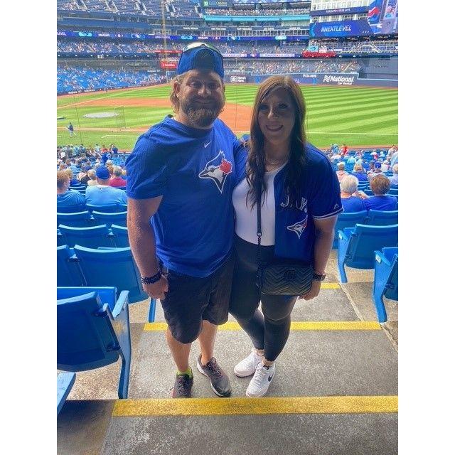 We met at a softball tournament and still play ball together. We love watching and playing baseball in the summer.
