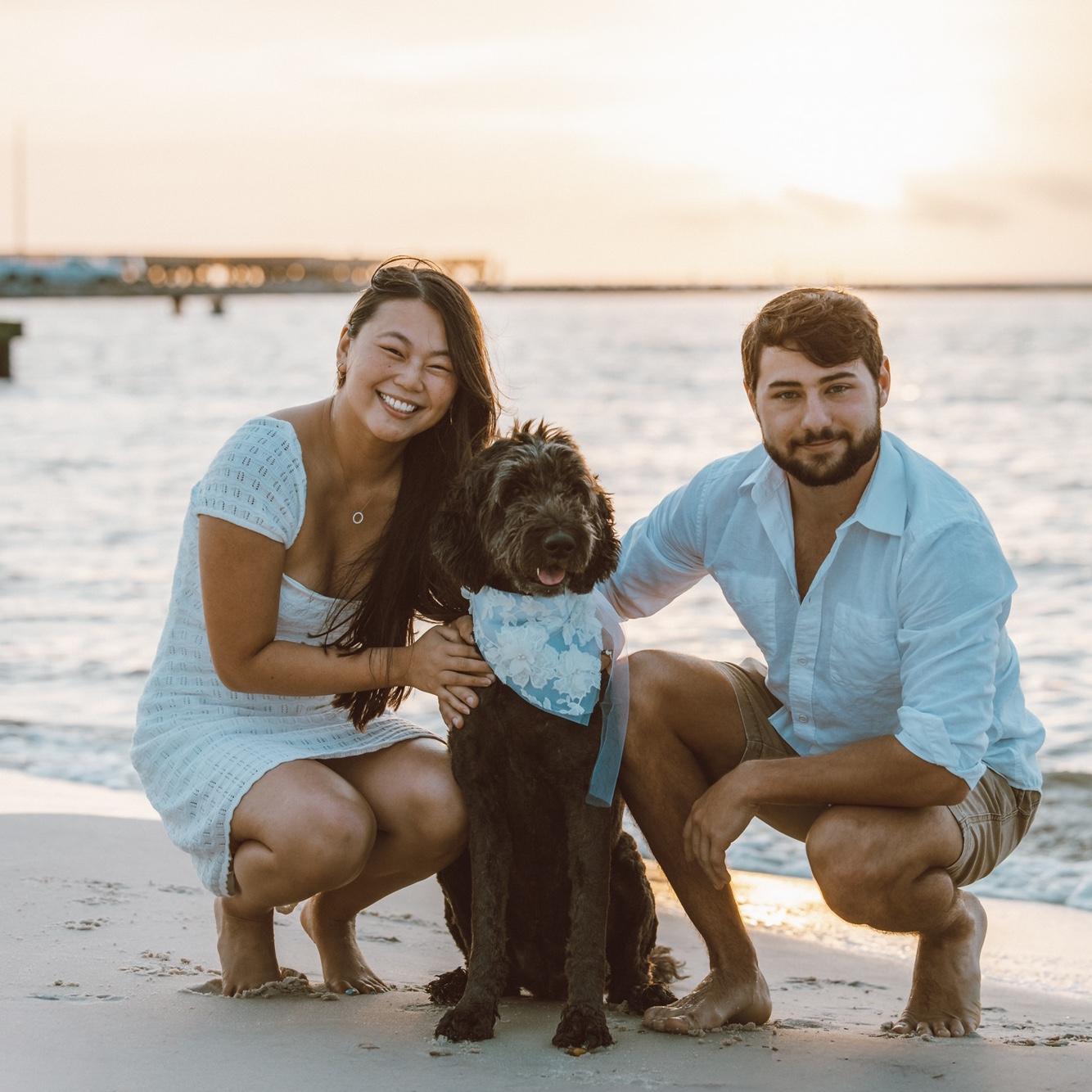 A cherished family photo with their beloved dog at the Washington Pier in Bay St. Louis — the very city where they’ll soon say ‘I do” soon.