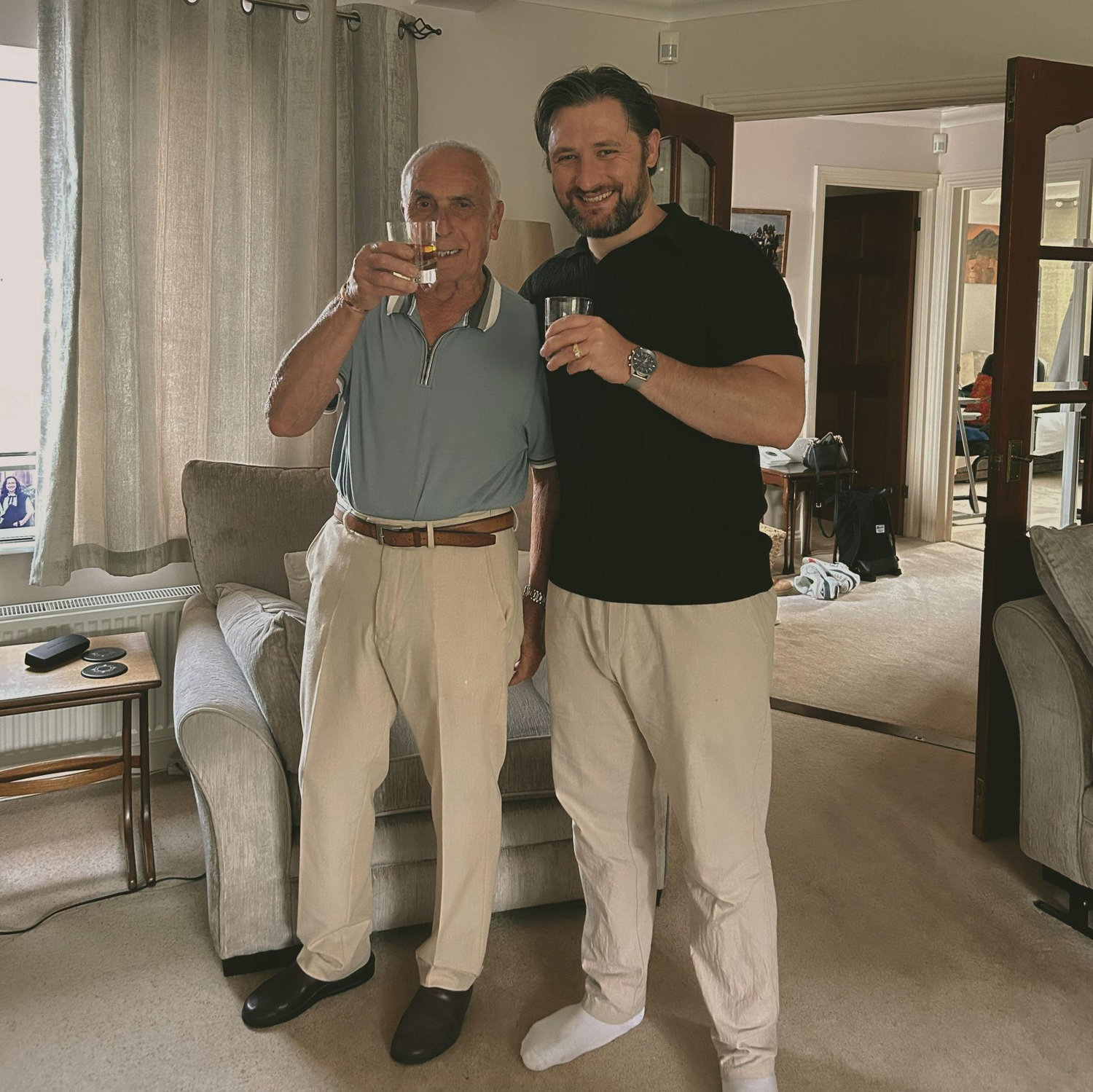 Nick & Nonno having a (rather large) whiskey together to celebrate the engagement of Debbie & Nick! Nonno is the one wearing beige pants.