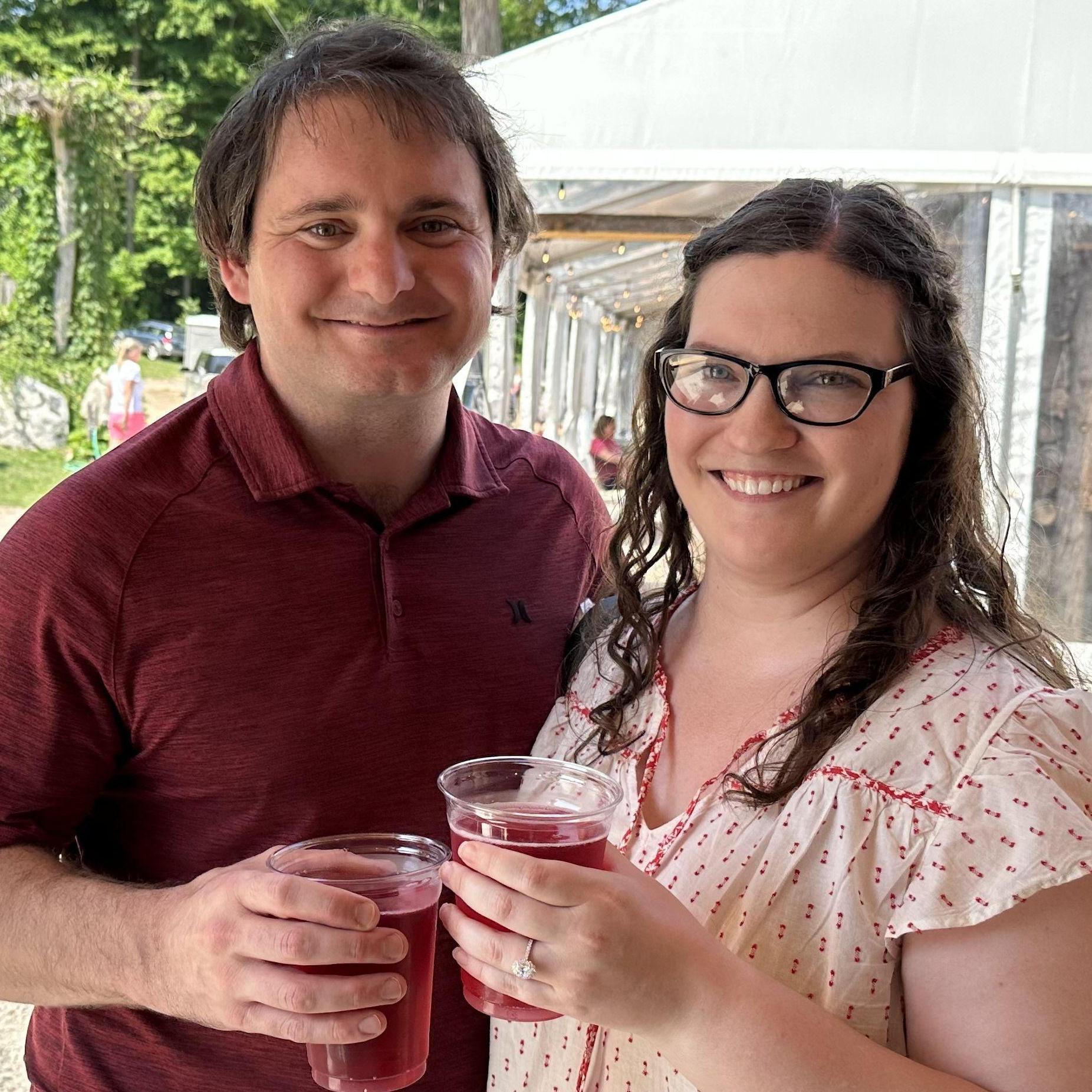 Celebrating our engagement with cider at Pond Hill Farm in Harbor Springs, Michigan July 2023