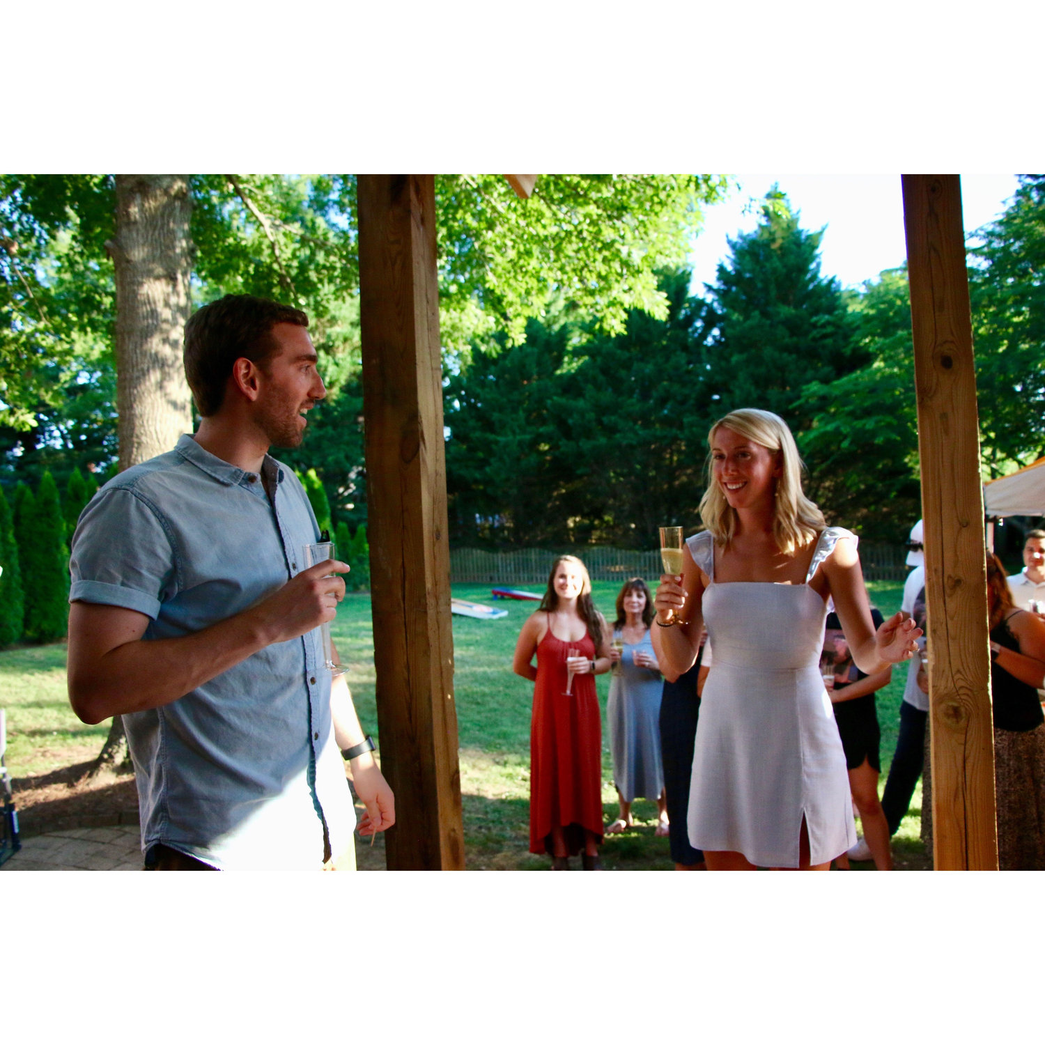 Our first picture! Hunter gave a speech at McKenzie's engagement party and there I am right in the middle. 6/20/20