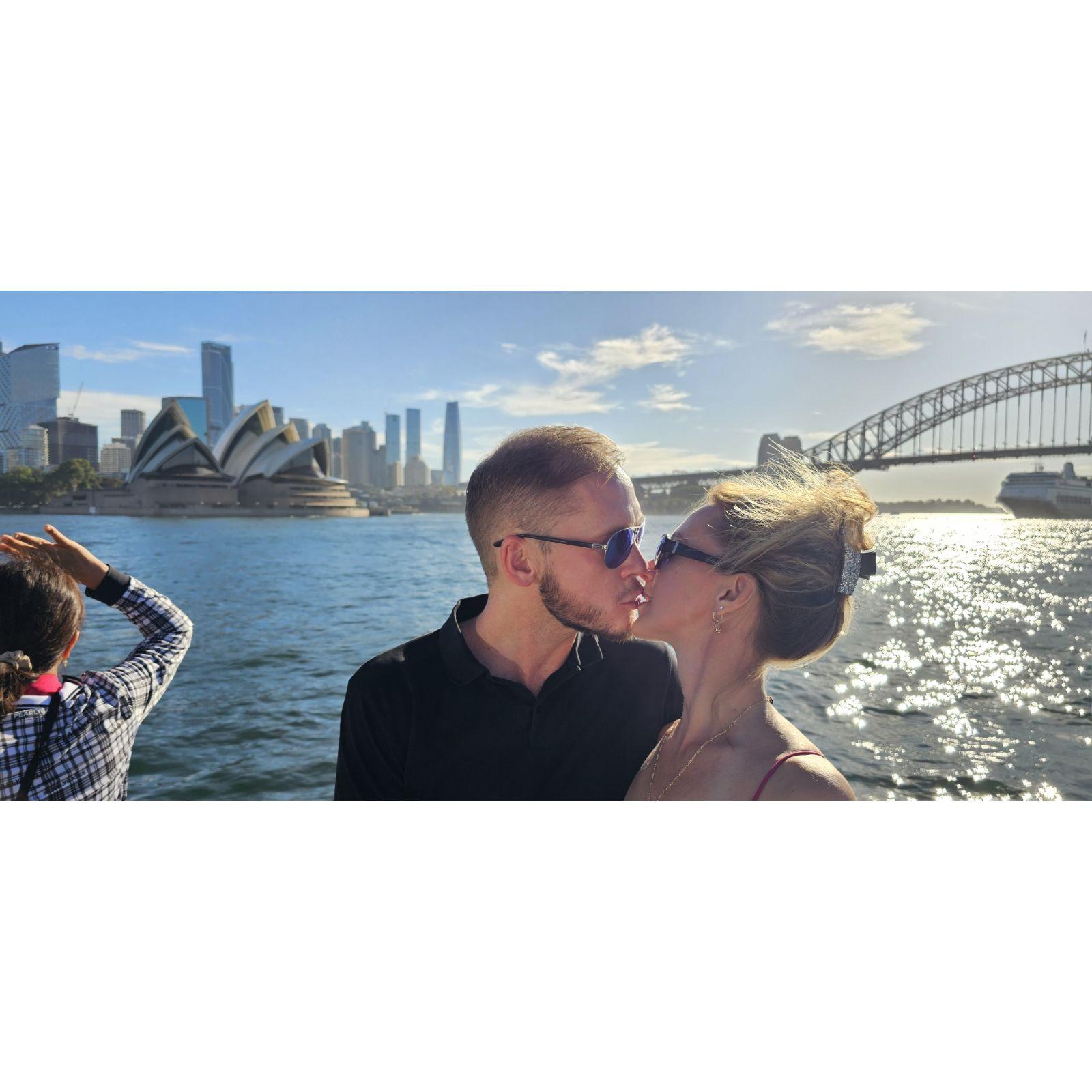 Kissing in front of the Sydney Opera House and the Sydney Harbor Bridge in Laura's favorite city: Sydney!