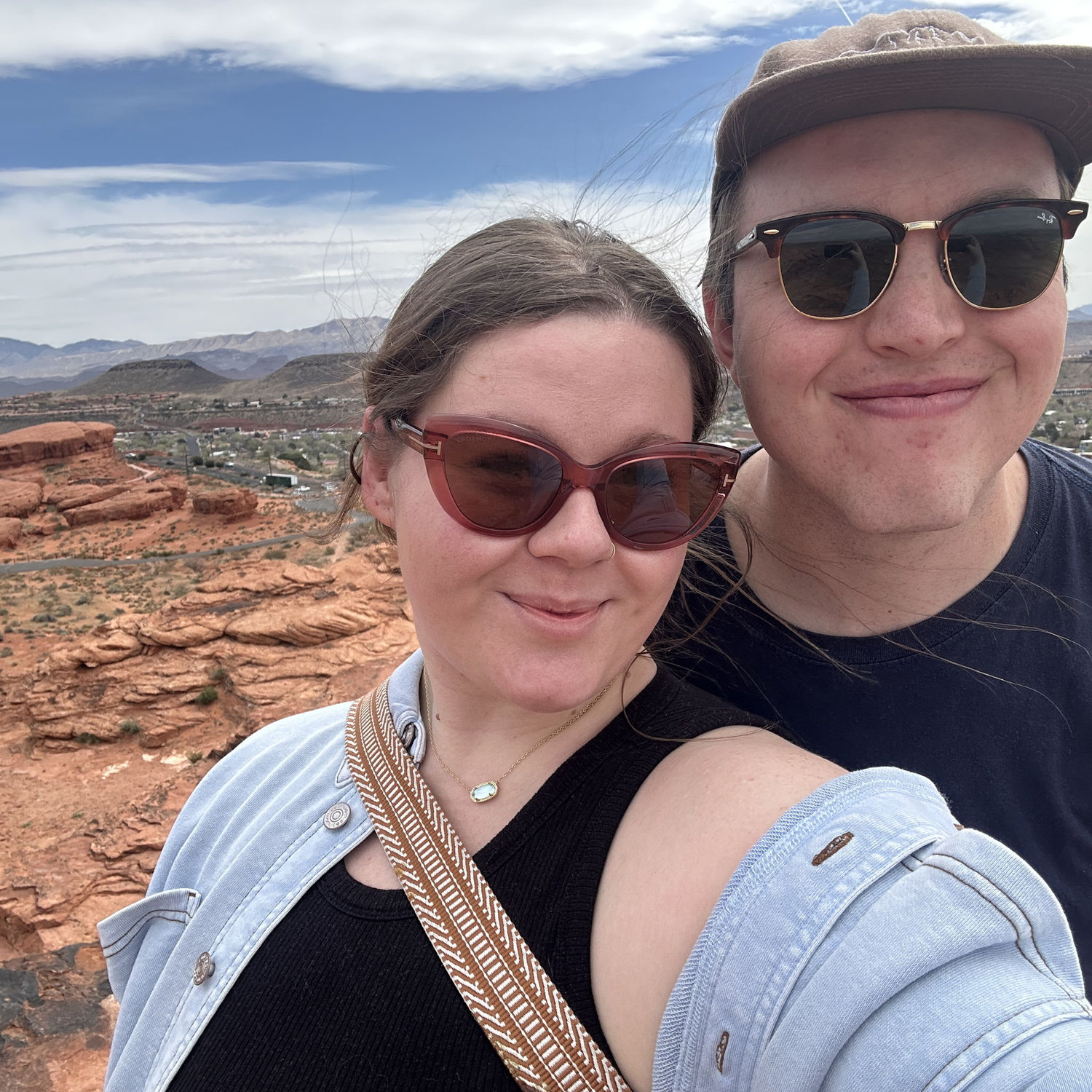Always have to climb on the red rock on our St. George trips