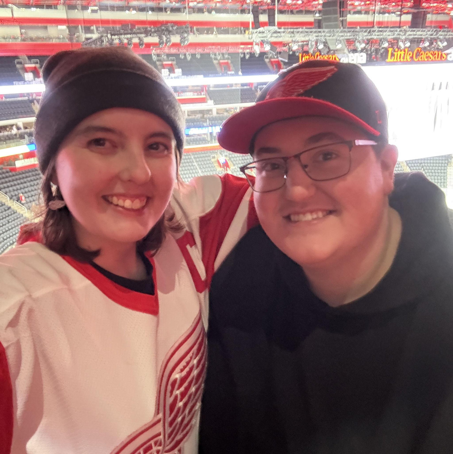 Jay's 2025 Christmas present to Lake: tickets to a Detroit Red Wings game! Little Caesars Arena, January 2026.