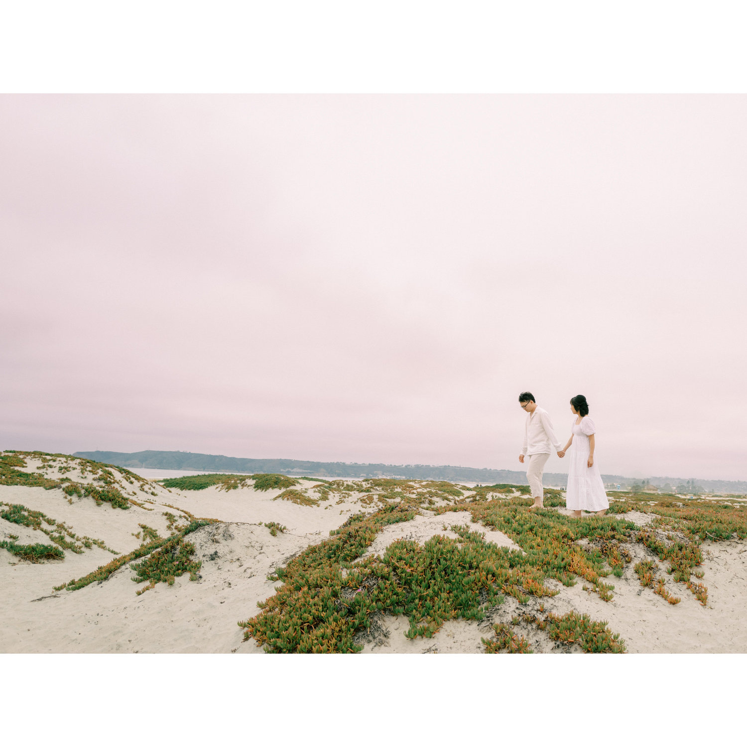 Our engagement photoshoot in Coronado Island, featuring the pink sky.