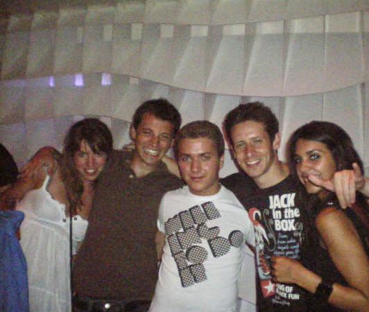 This photo is form the night we met in Madrd in July 2008. Don’t recognize us? We are the first two on the left. Our friend Javier is in the Jack in the Box t-shirt. You’ll meet him at the wedding!