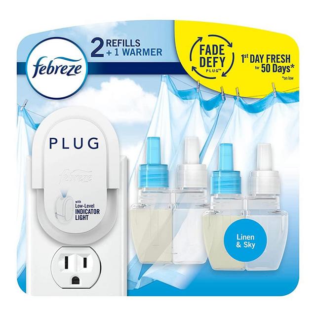 Febreze Odor-Fighting Fade Defy Plug Air Freshener, Linen & Sky, Starter Kit & (2) .87 fl. oz. Oil Refills