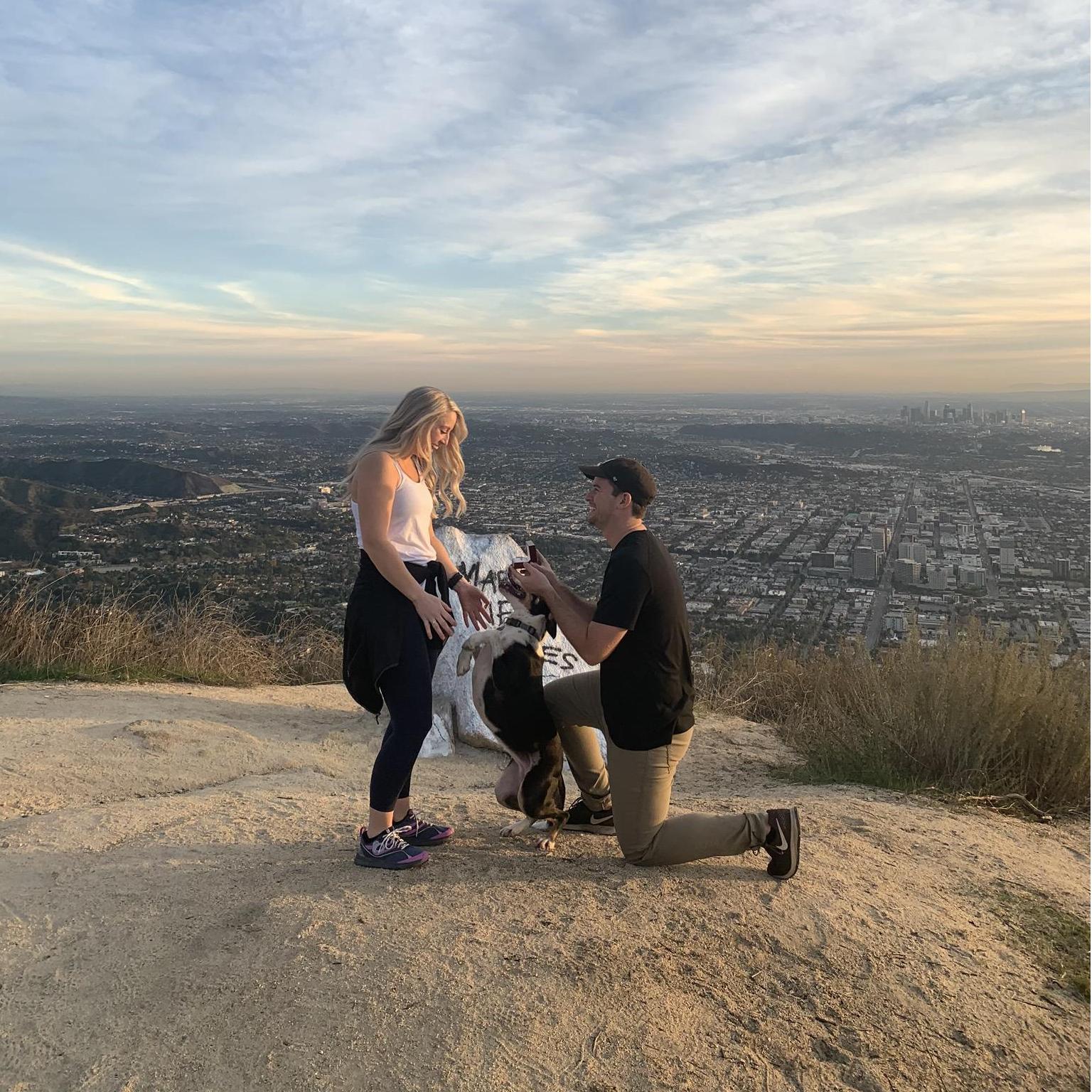 Mazie and Ellie both saying "yes!" on a hike in Glendale, with a beautiful Los Angeles backdrop on 12/20/2019