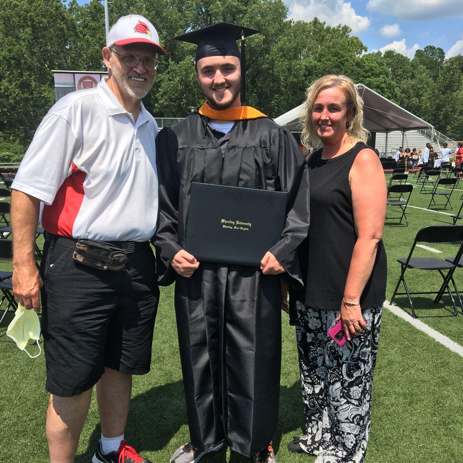 Josh with his parents Curt and Jodi.