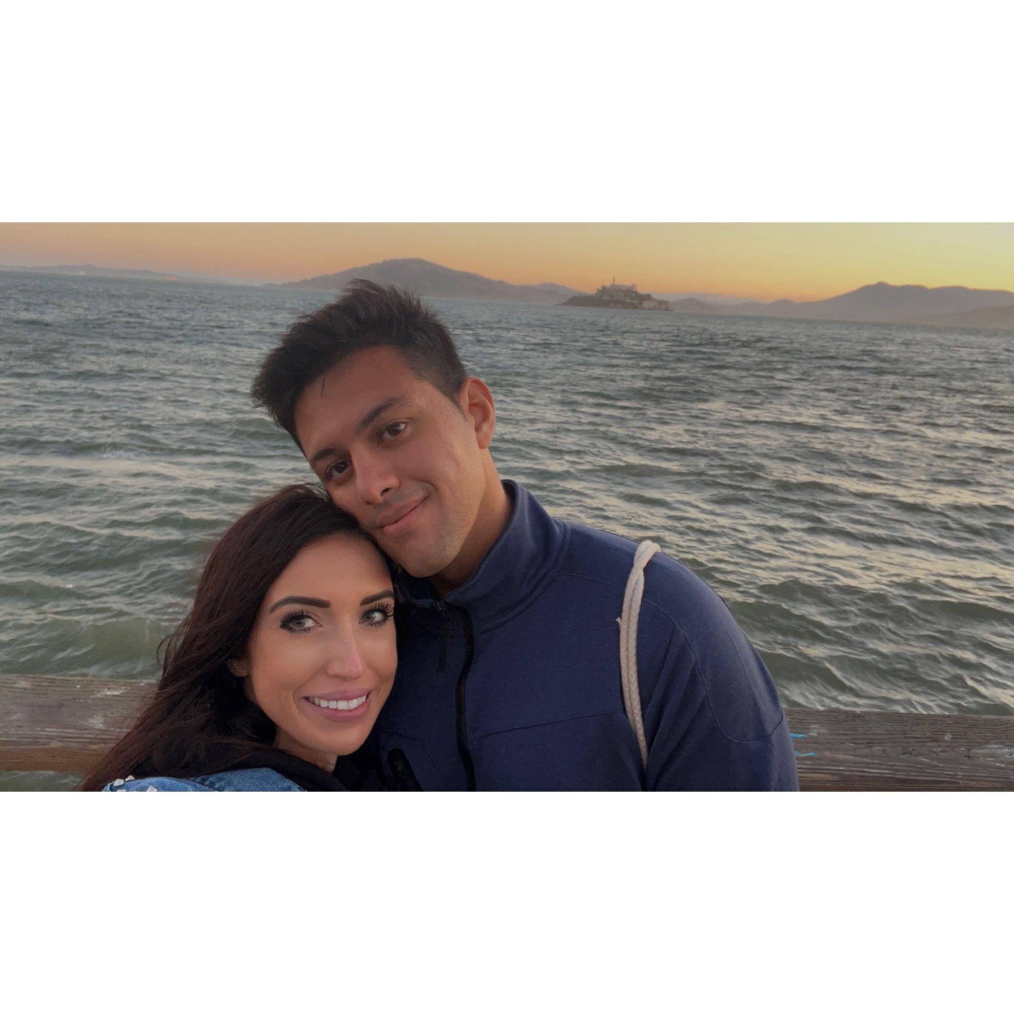 First picture as a couple infront of Alcatraz island.