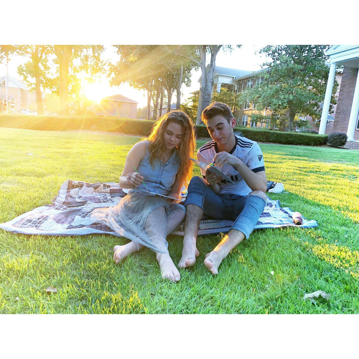This is us on a picnic date in front of Berry Chapel at OBU. We enjoyed the beautiful evening by painting canvases.