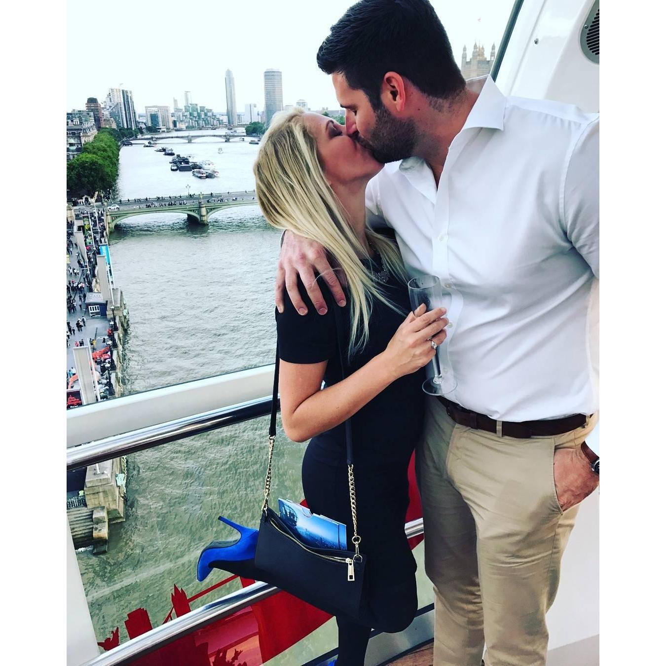 Celebrating 6 months together with champagne on the London Eye!