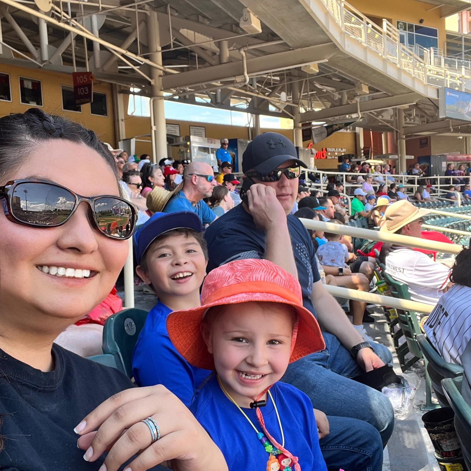 We love Baseball!!
And Going to Games. And Yes Scott Answers His Work Phone Everywhere.
Fun Fact: The Groom Played Baseball and The Bride Played Softball.
Our lovely niece Sophia and Son Dante.