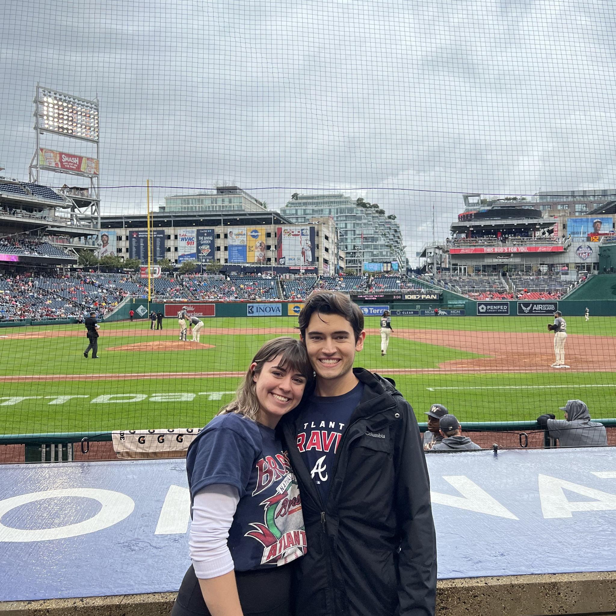 Caleb loves Braves baseball. For his first birthday they spent together, Marissa bought them tickets to go watch them at Nationals Park.