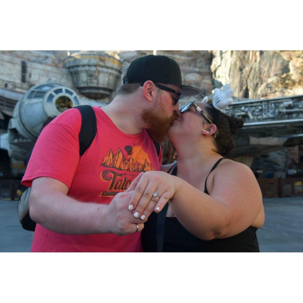 just a couple of Star Wars nerds doing a cheesy shoot infront of the Millenium Falcon!