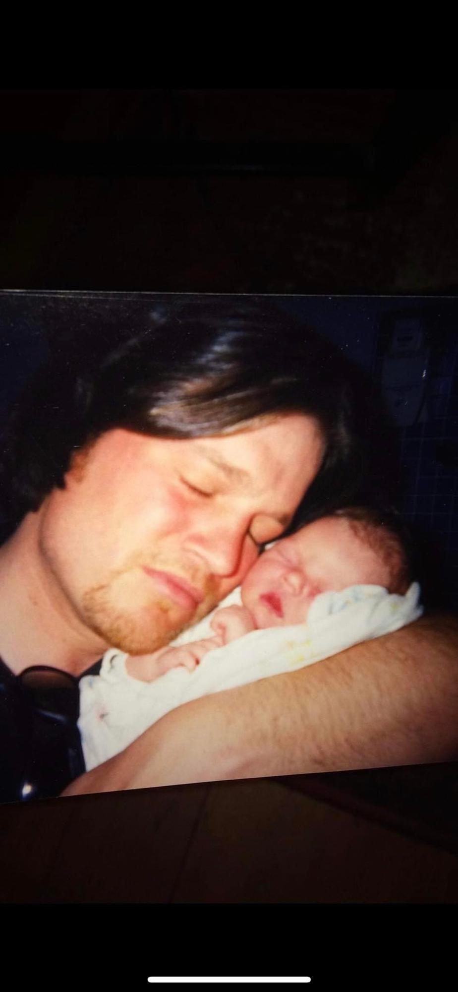 My dad and I the day I was born