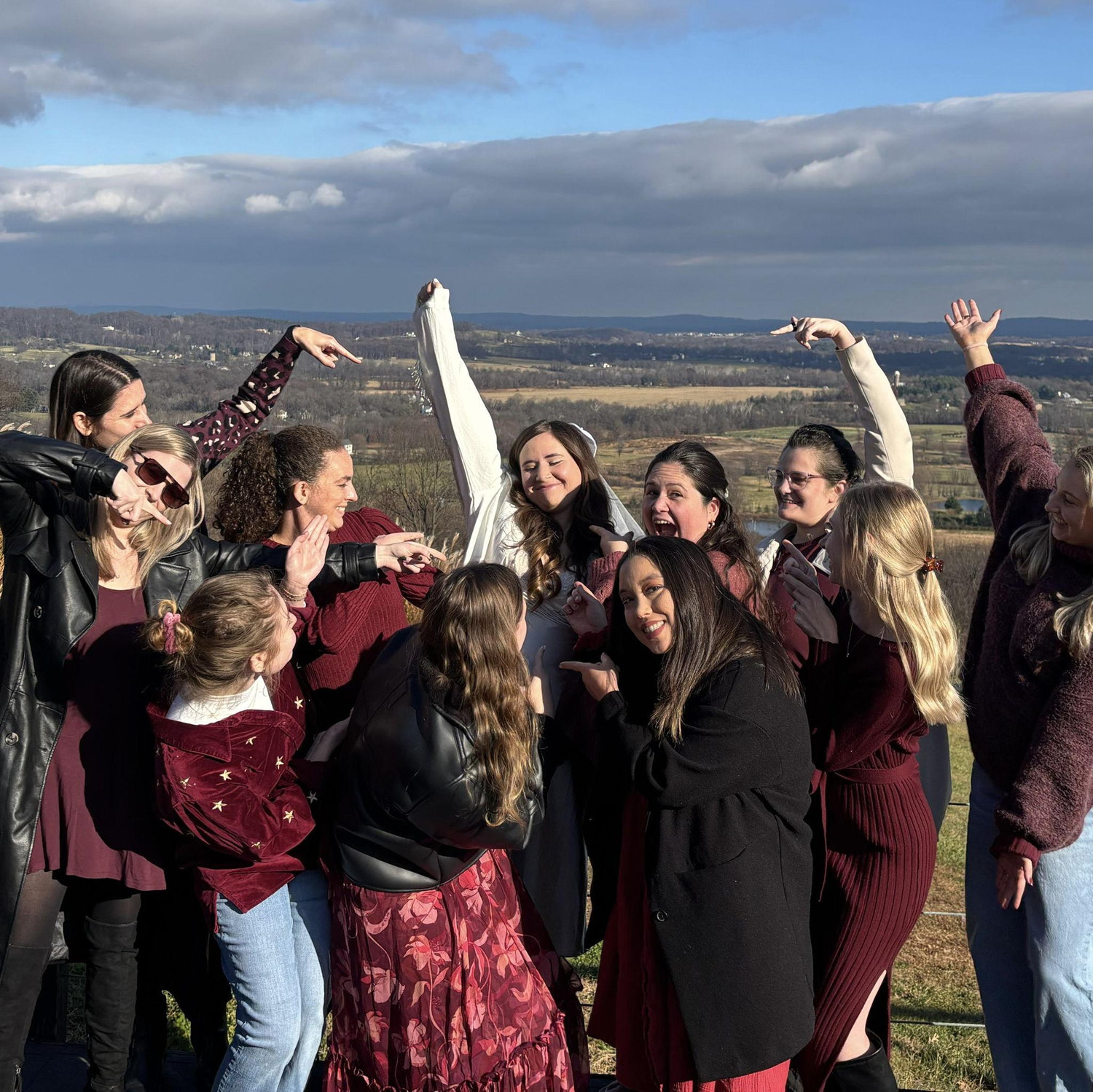 Grace's friends dressed as red wine and Grace dressed as champagne for her winery bachelorette!