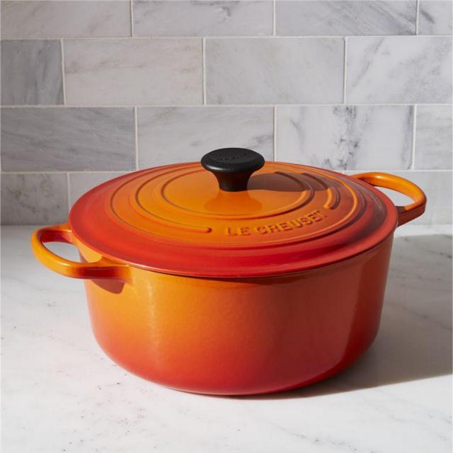 Le Creuset Enameled Cast Iron Round French Oven Color: Flame, Size: 7.25-qt.