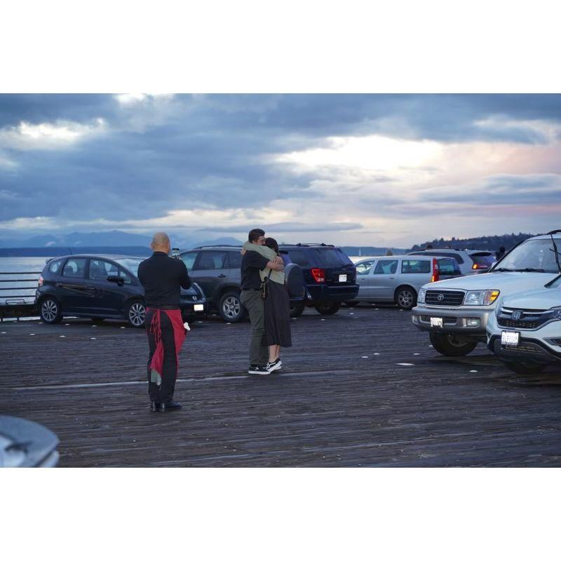 We got dinner at Elliot's Oyster House where Nicholas convinced our waiter to take pictures of our proposal, right outside on our favorite pier in Seattle! 06|15|2024
