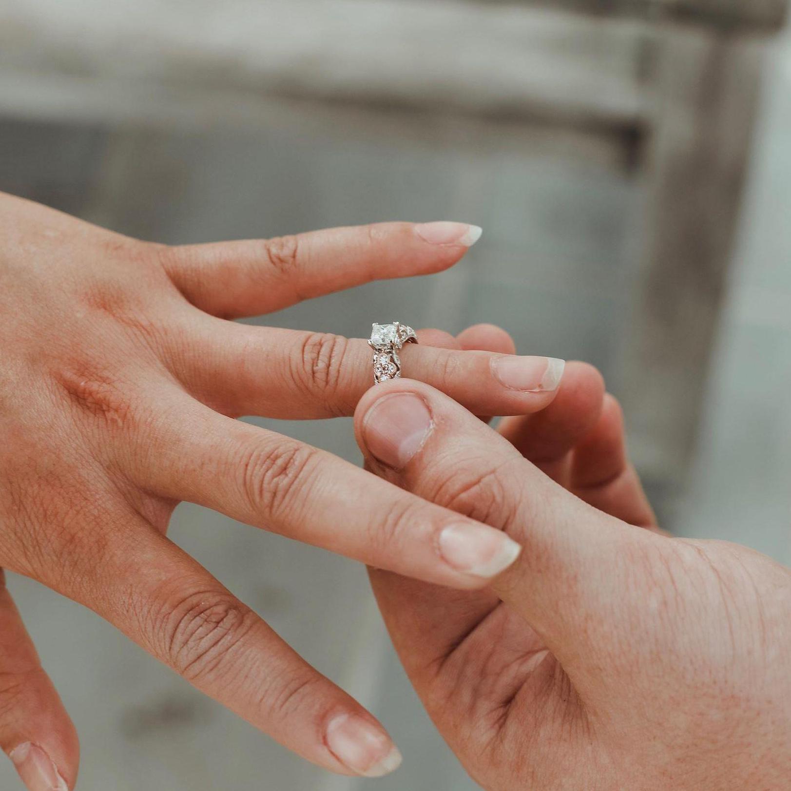 Putting the ring on her finger