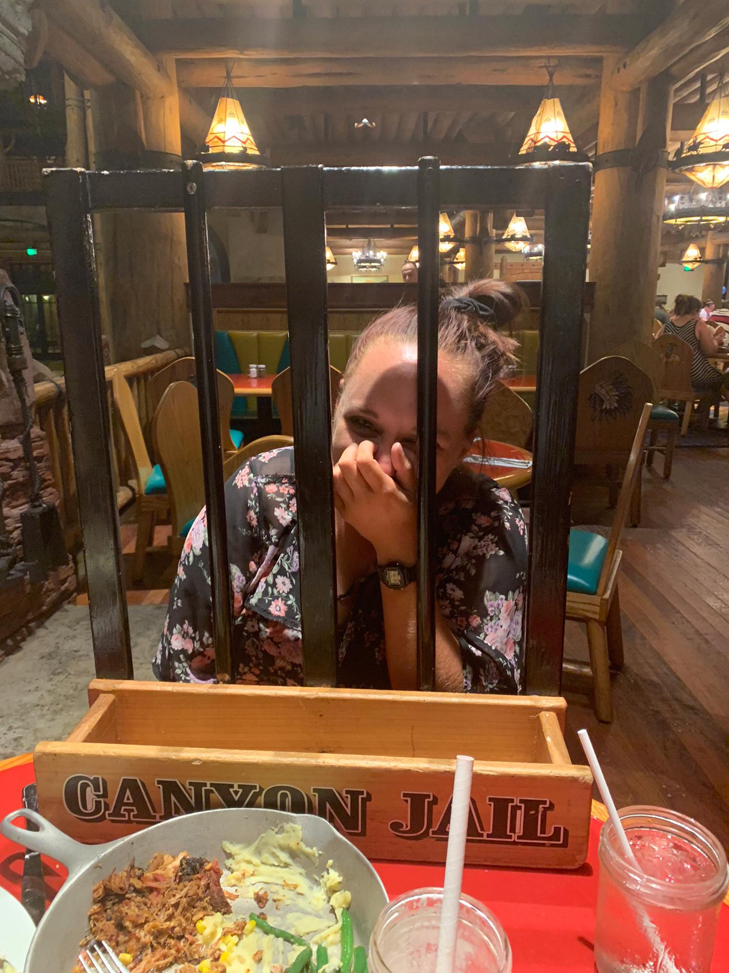 We went to Whispering Canyon Café for dinner and we were goofing around. I threw some food at her, then she threw food back, but the waitress only saw Liz throwing the food so she put Liz in jail.