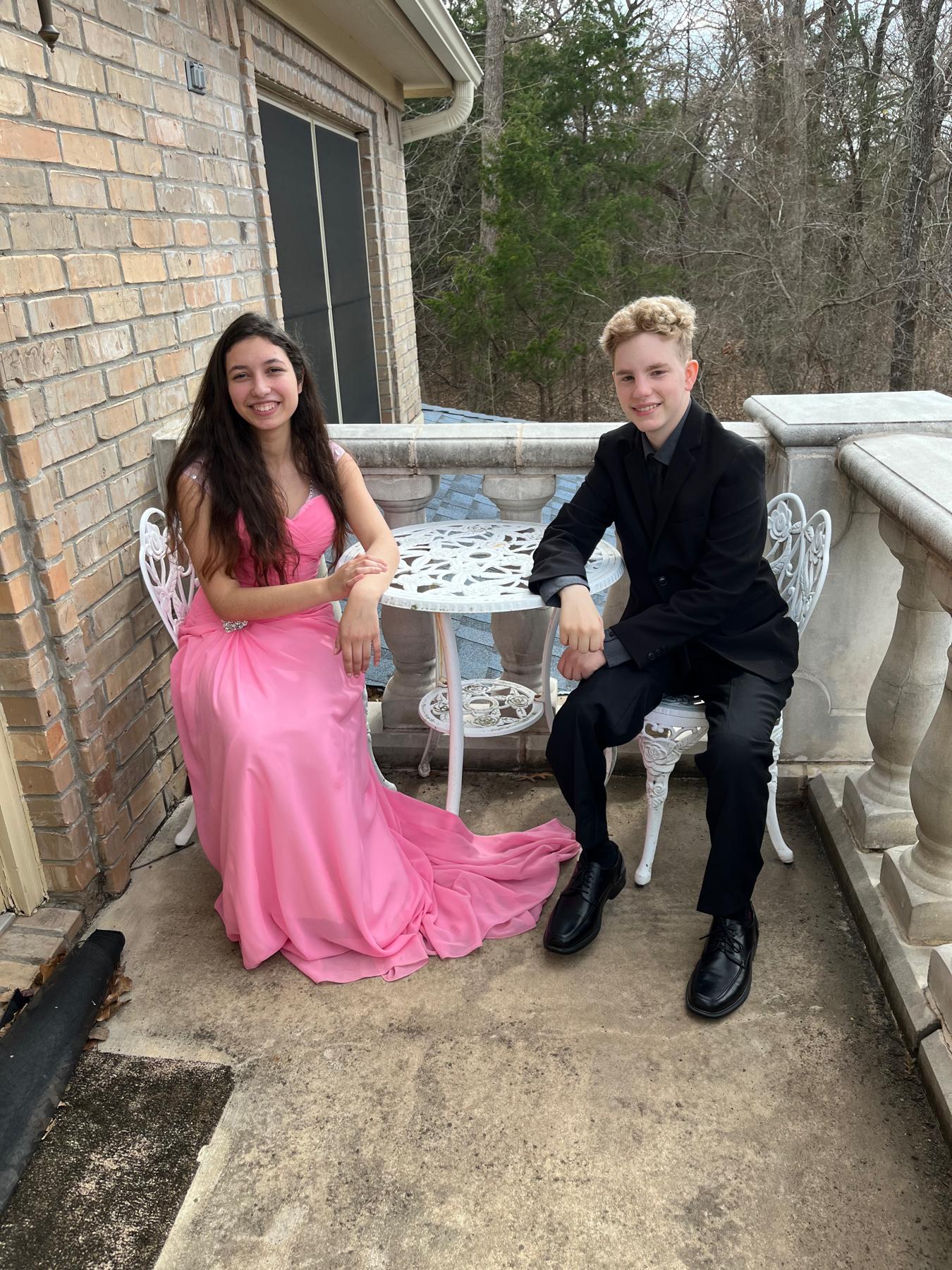 Taken at a friend’s house the day after Elisa’s birthday party. The first “date” we had at a restaurant; Michael used missing her party as an excuse to take her out.